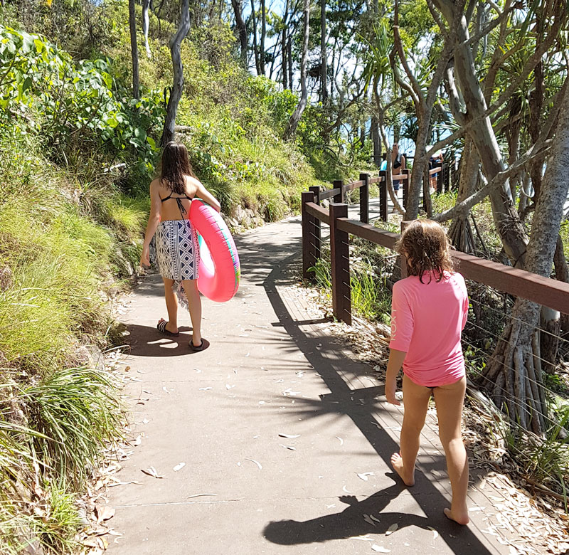 Walking along the National Park looking at the wildlife and taking dips in the little bays, just a short walk from The Cove Noosa