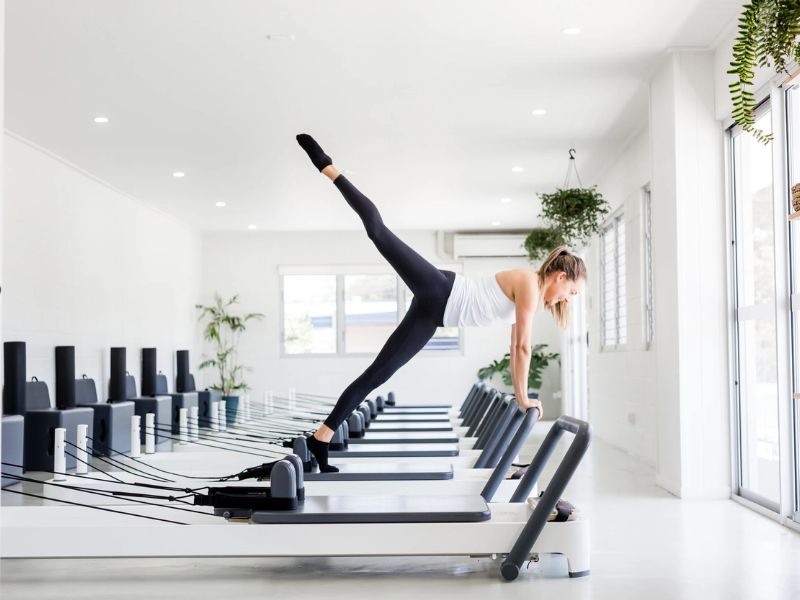person doing reformer pilates