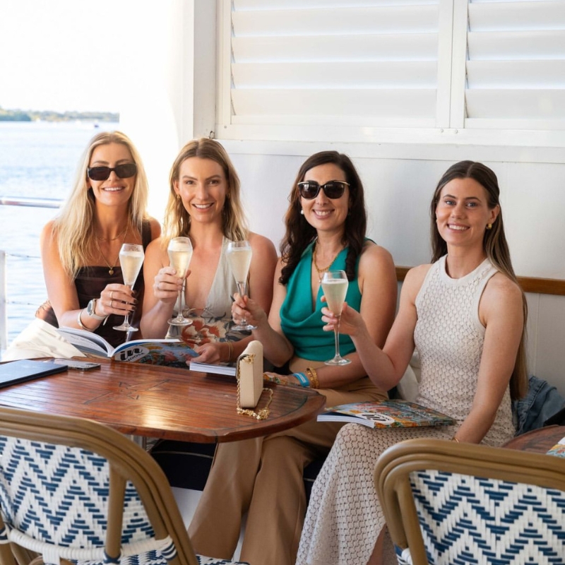women with drinks onboard catalina